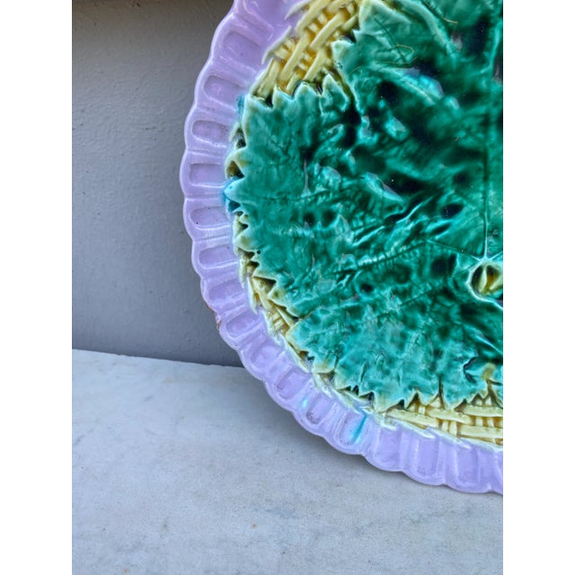 English Majolica Bowl with Leaf on a basketweave background Circa 1890.