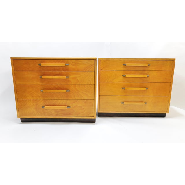 A stunning and rare matched pair of four-drawer chests designed by Eliel Saarinen and his daughter Pipsan Saarinen Swanson...