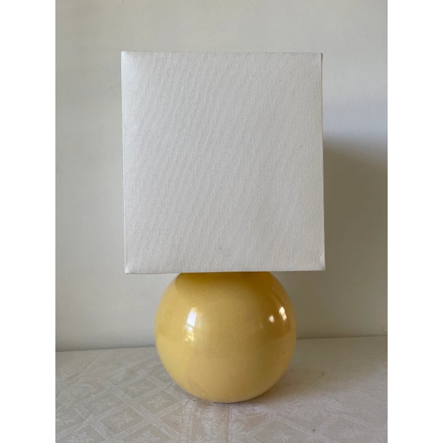 Ceramic French lamp sign modern art 1960 vanilla color lamp in round shape. The artisanal ceramic gives a beautiful effect...