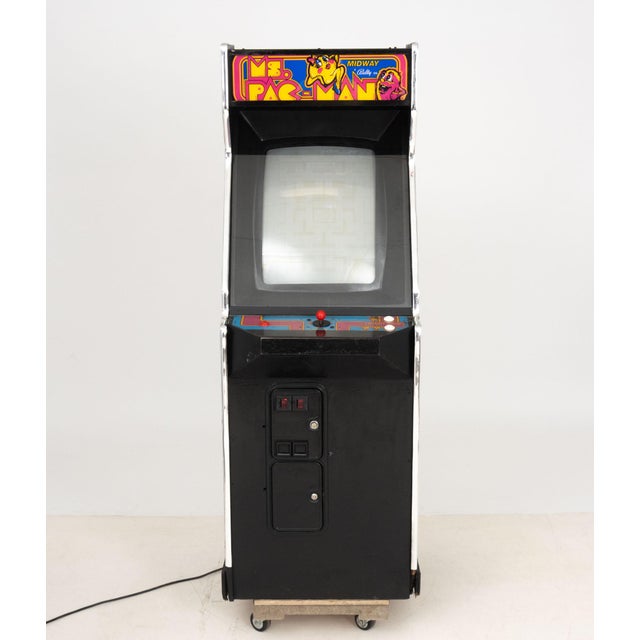 Bally Midway Ms. Pac-Man Video Arcade Game, 1981, two-player and multi-game system. 72" H x 25.25" W x 32.5" D....