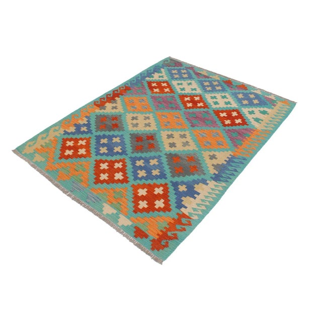 Add a touch of elegance to your home with this casual chic hand woven Tribal Kilim wool rug. Constructed on a loom by...