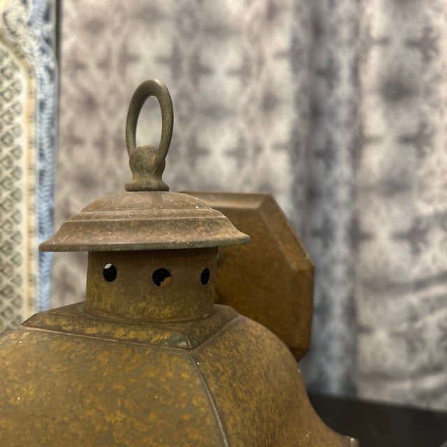 Fantastic rustic antique metal lantern repurposed into a wall mount electrified light. This lantern- light shows a lot of...