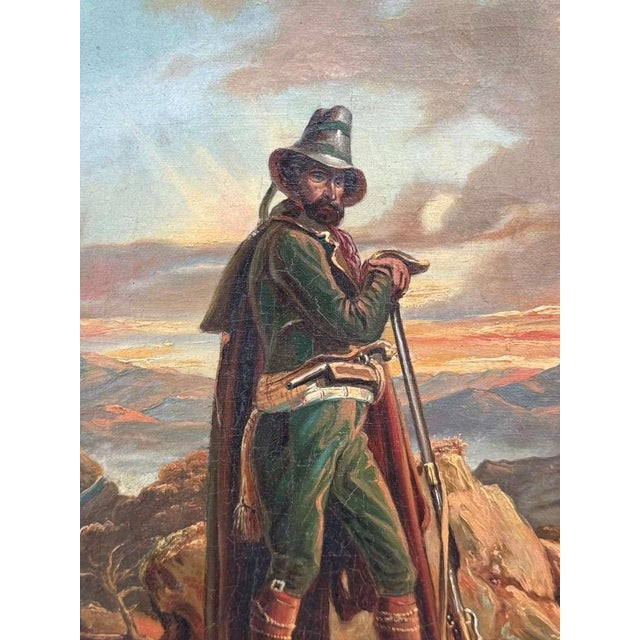 A striking 19th century European oil on canvas depicting Der Grenzer (“The Border Guard” / “The Frontiersman”), portraying...