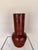 Contemporary decorative sculpture crafted from terracotta, featuring a rich earthy glazed finish and a bold, organic...