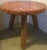 Cool and unusual wood round side table. Legs are rope covered and the top has a thick layer of resin. Few scratches on top...