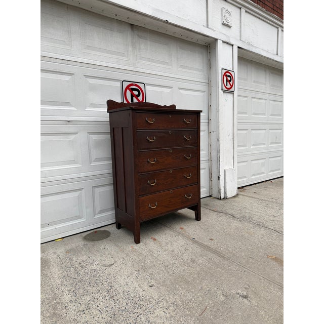 We have an absolutely beautiful antique oak tallboy dresser for sale. This early 20th century Arts and Crafts chest of...