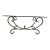 Vintage Hollywood Regency Style Coffee Table Featuring a Gold-Finished Wrought Iron Base With Scrollwork and an Oval Beveled Glass Top For Sale