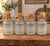 Wonderful matching set of four antique textured glass jugs, each bearing the IPG triangle mark attributed to Illinois-...