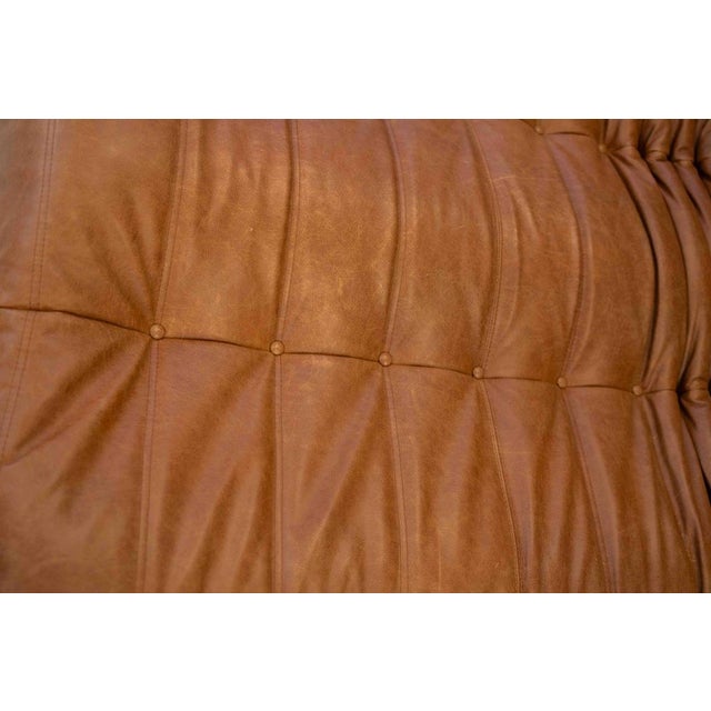 This Togo has been reupholstered with new foam and high-quality new fabric, keeping its inner structure, giving the item...