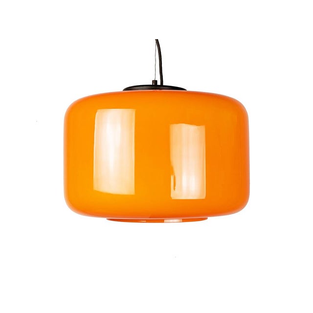 This pendant lamp was produced approximately in the 1960s. It is made of a black metal structure with a beatiful...