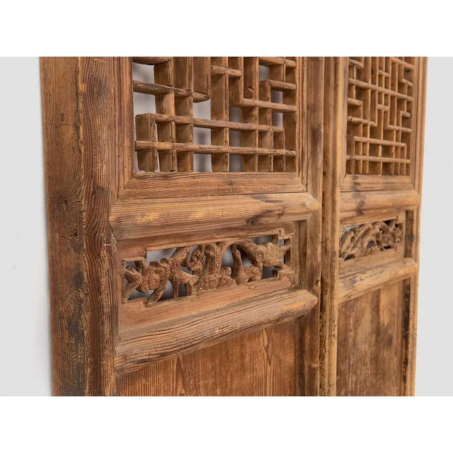 Antique Chinese door (c.1890) Approximate age: 130 years Material: Wood Our antique Chinese door is a unique piece that...