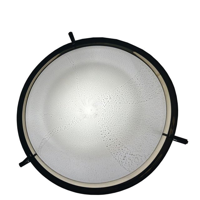 Gorgeous piece of white, black and light amber Murano Glass. Halogen lamp. The diameter indicated in the dimensions...
