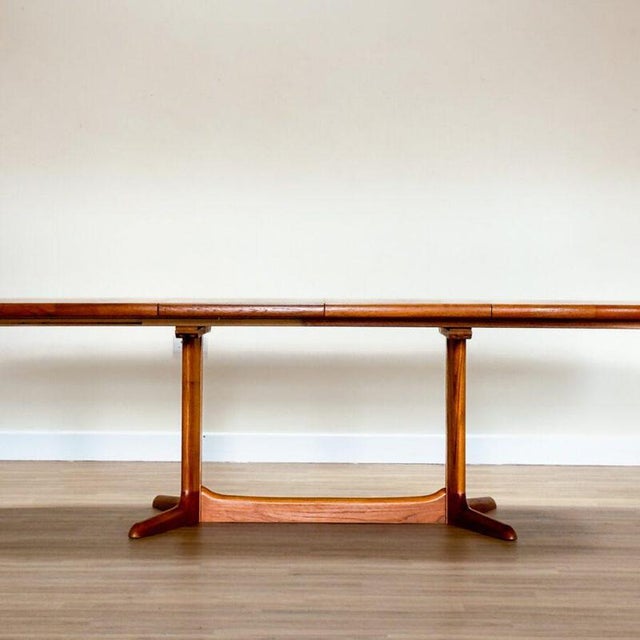 A beautiful 1960s Danish mid-century double extending dining table, designed and handcrafted by Skovby in Denmark. Made...