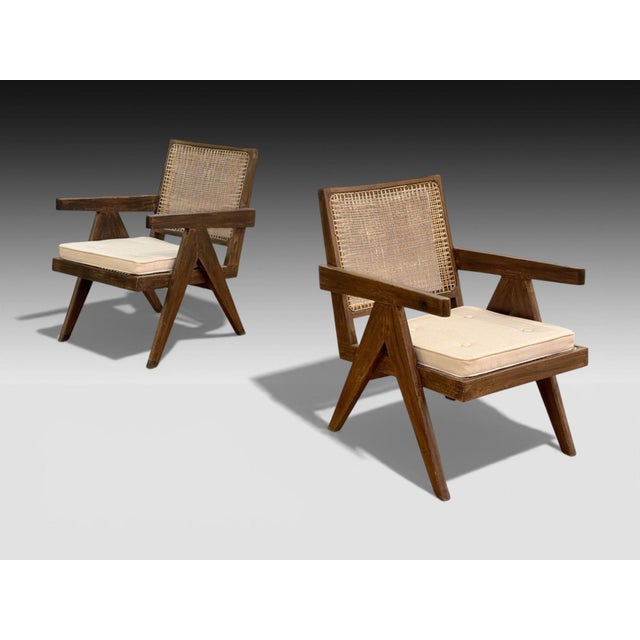 Pierre Jeanneret, Stained Teak, Cane, 'Low Easy' Model PJ-SI-29-A Lounge Chairs, Chandigarh, India c. 1960s Iconic pair of...