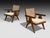 Pierre Jeanneret, Stained Teak, Cane, 'Low Easy' Model PJ-SI-29-A Lounge Chairs, Chandigarh, India c. 1960s Iconic pair of...