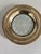 This elegant vintage bottle coaster features a reticulated pierced sterling silver rim with an ornate repoussé border,...