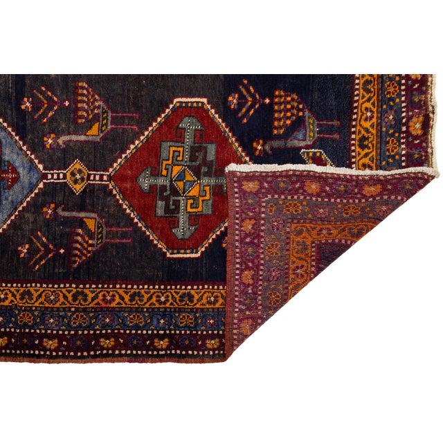 Transform your hallway or entryway with this exquisite Vintage Persian Qashqai Runner. Hand-knotted from 100% natural...