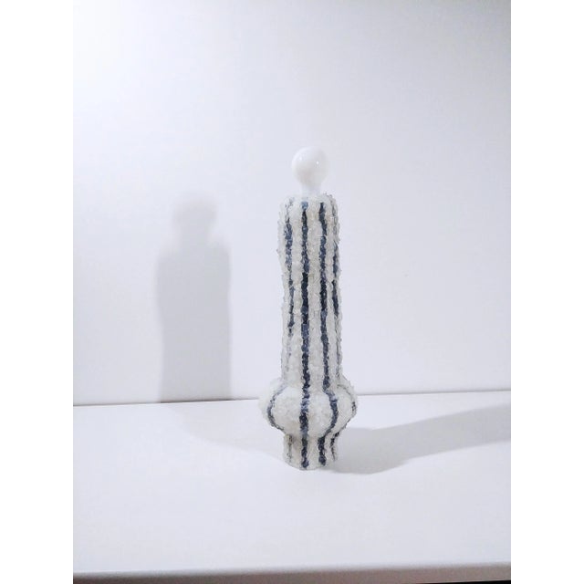 Marty sculpted lamp by Johan Destrumelle Unique piece, handmade in foam, silicone and concrete. Dimensions: 55 x 16 x 16...