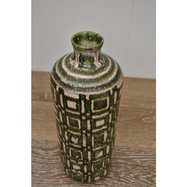 Fabulous mid century Italian pottery vase in green and off white. Appears to have been fitted for a lamp. Maker mark...
