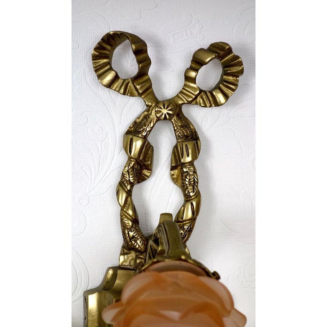 Beautiful antique empire wall lamp, which has an impressive design off and throws very nice light even when the condition...