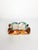 Beautiful Italian flower-shaped colored glass ashtray dating from the 1960s, featuring an elegant sculptural design and a...