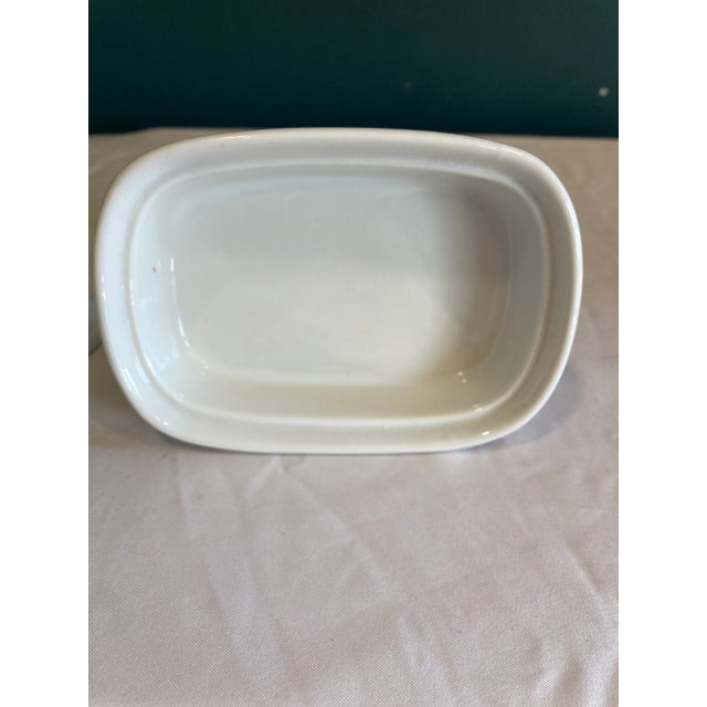 his elegant Liette International ceramic soap dish features a refined white glaze embellished with maroon and gold scroll...