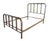 This Victorian full-size brass bed frame showcases the enduring elegance of turn-of-the-century metal craftsmanship. The...