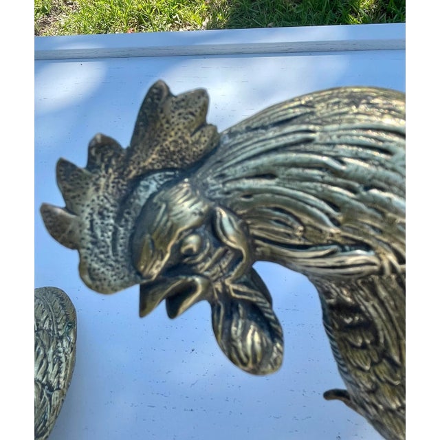 Pair of Midcentury Brass Fighting Roosters. These are a wonderful pair with attention to detail. They are in good vintage...