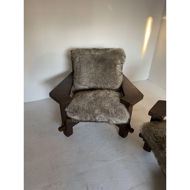 Pair of pine and rope brutalist armchairs with faux fur cushions. This piece is attributed to the mentioned...