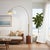 The Tambo Arc Lamp is a dimmable mid-century modern arc lamp with a weathered brass steel body, offering adjustable light...
