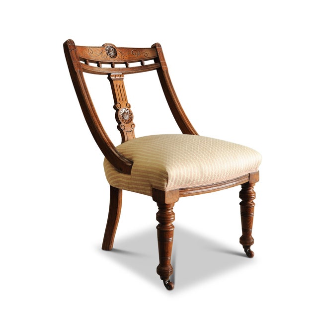 Victorian Striped Upholstery & Oak Open-Frame Library Chair with Carved Motifs & Ceramic Castors For Sale - Image 5 of 5