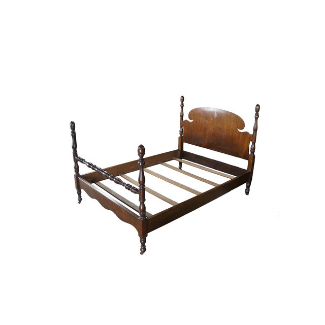 Antique mahogany four poster bed frame featuring Colonial styling with turned posts, acorn finials and curved camelback...