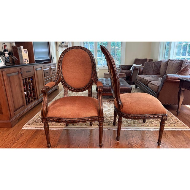 A stunning set of 8 dining chairs by Marge Carson, masterfully crafted in the Louis XVI style with impeccable attention to...