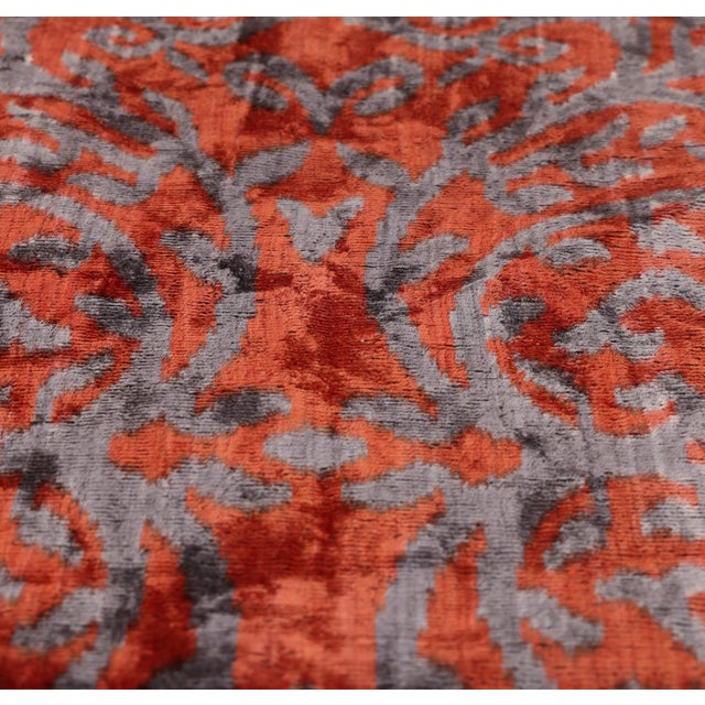 "Command focus with the architectural elegance of this hand-knotted silk velvet ikat pillow. Measuring 16x16 inches (40x40...