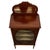 An elegant early 20th-century English display cabinet, finely crafted from mahogany and distinguished by its delicate...