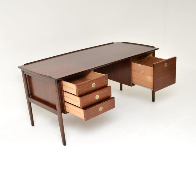 A stylish and extremely well made Danish vintage executive desk. This was made by Dyrlund, it dates from around the...