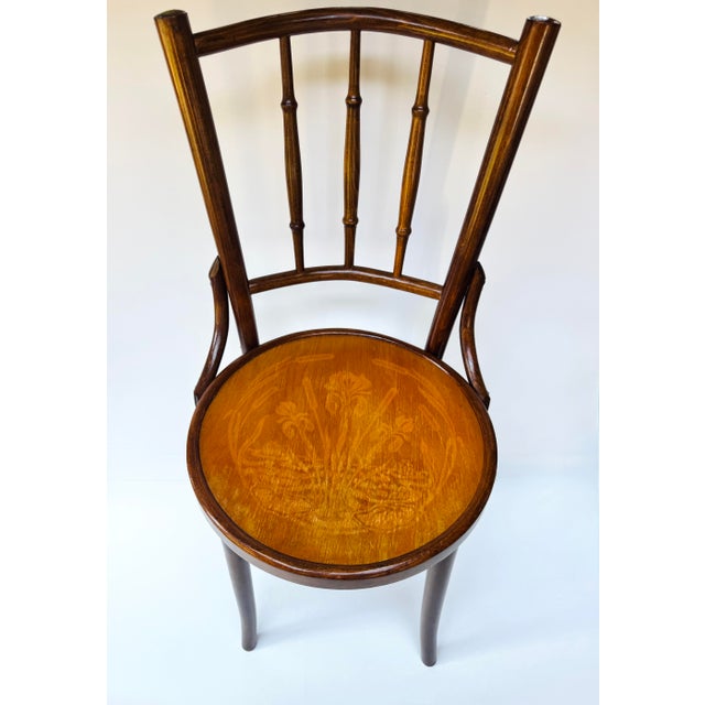 Antique J. & J. Kohn / Mundus Model 337 bentwood chair, made in Romania in the early 20th century. An especially...