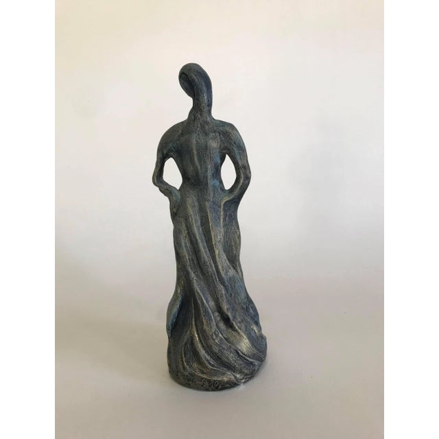 Free form plaster sculpture depicting a female figure Dimensions; 5"Width x 5"Depth x 13.5"Height See pictures and...