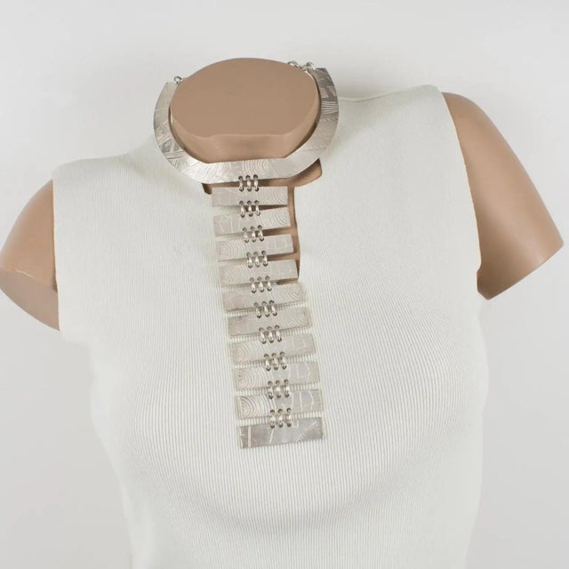 Nelly Biche de Bere Paris designed this impressive futuristic silver plate plastron necklace. The rare pendant necklace...