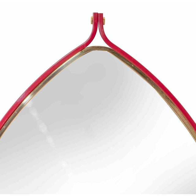 Vintage Consolle with wall mirror is an original design furniture realized by Tommaso Barbi in the 1970s. Lacquered Metal,...