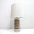 Wonderful glazed ceramic table lamp in a textured, off-white color with golden geometric decorations. marked ‘BI 35/114,...