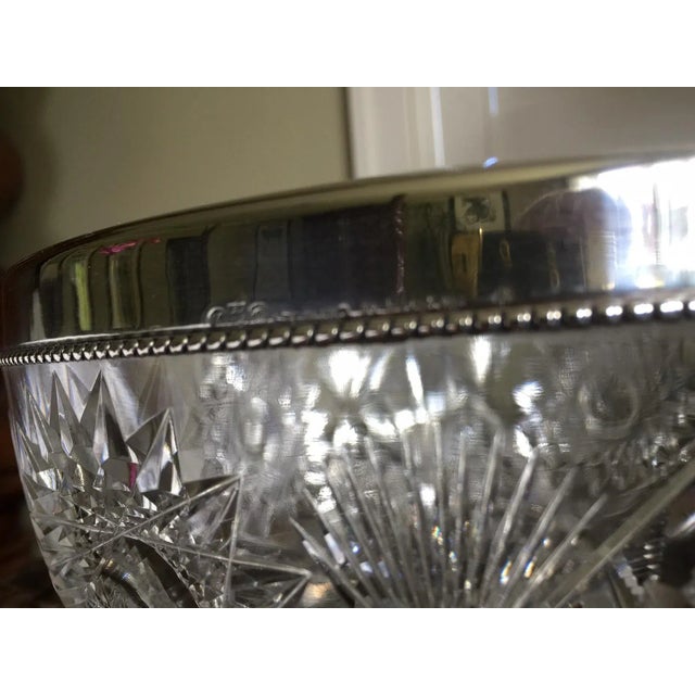 Gorgeous brilliant cut glass and sterling (Signed) Bowl. Nine inches wide and three inches tall.