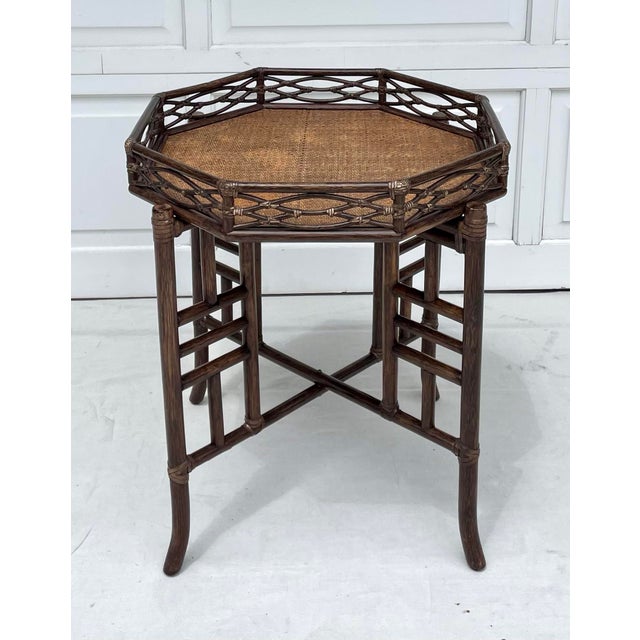 This vintage rattan tray table was made by McGuire Furniture of San Francisco, known for their luxurious handcrafted...