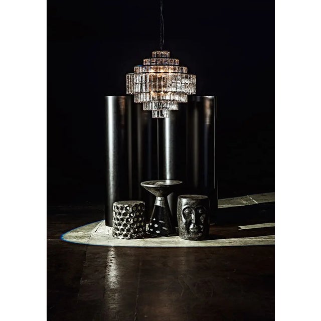 Crafted of fiber cement, a unique material which has a rich, natural texture that invites sculptural exploration, this...