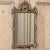 Antique Italian Carved Giltwood Rococo Style Mirror is a beautiful representation of the style, with a restrained...