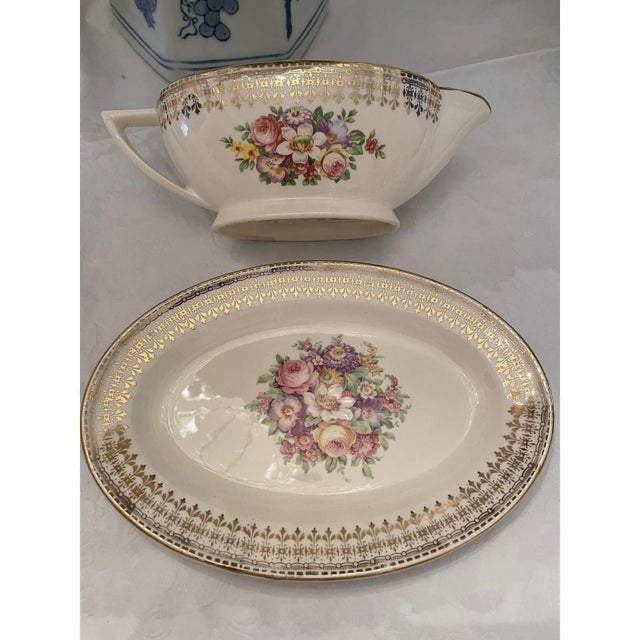Offered is a lovely vintage serving platter and bowl by The Edwin M Knowles China Co. This set features a floral design...
