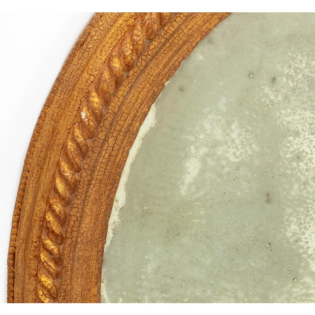 Victorian Style Giltwood Oval Beveled Wall or Vanity Mirror. 40" H x 32" W. Provenance: From an Upper East Side Collection.