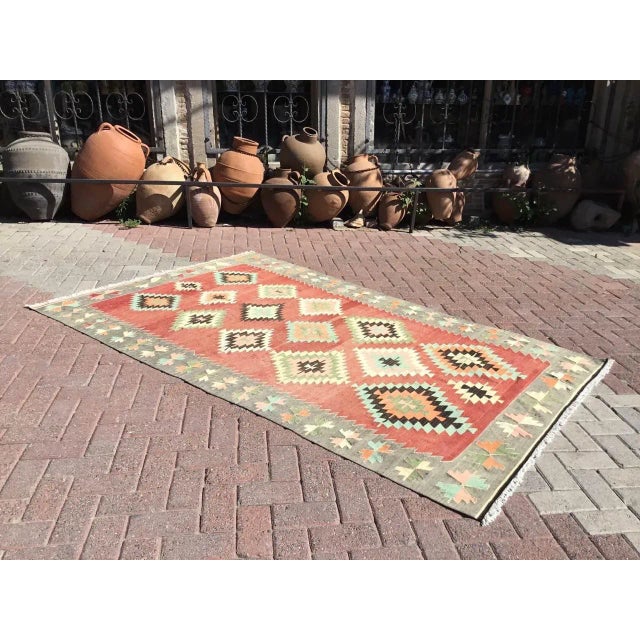 This beautiful, vintage, handwoven kilim is approximately 50 years old. It is handmade, of very fine quality hand spun...
