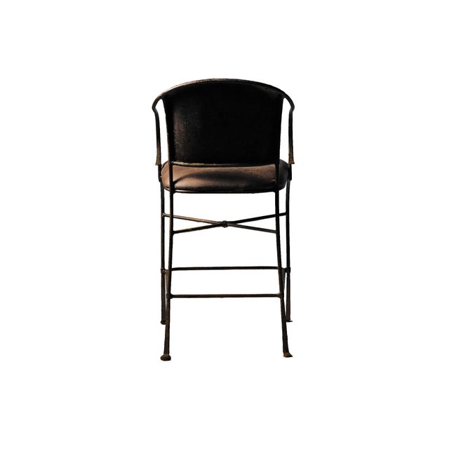 Pair of vintage, late 20th century traditional tall iron and leather stools.