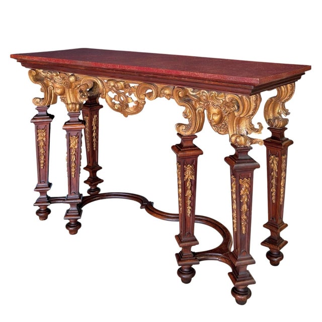An impressive late 18th century Baroque Revival console table of exceptional decorative presence, crafted in oak and...